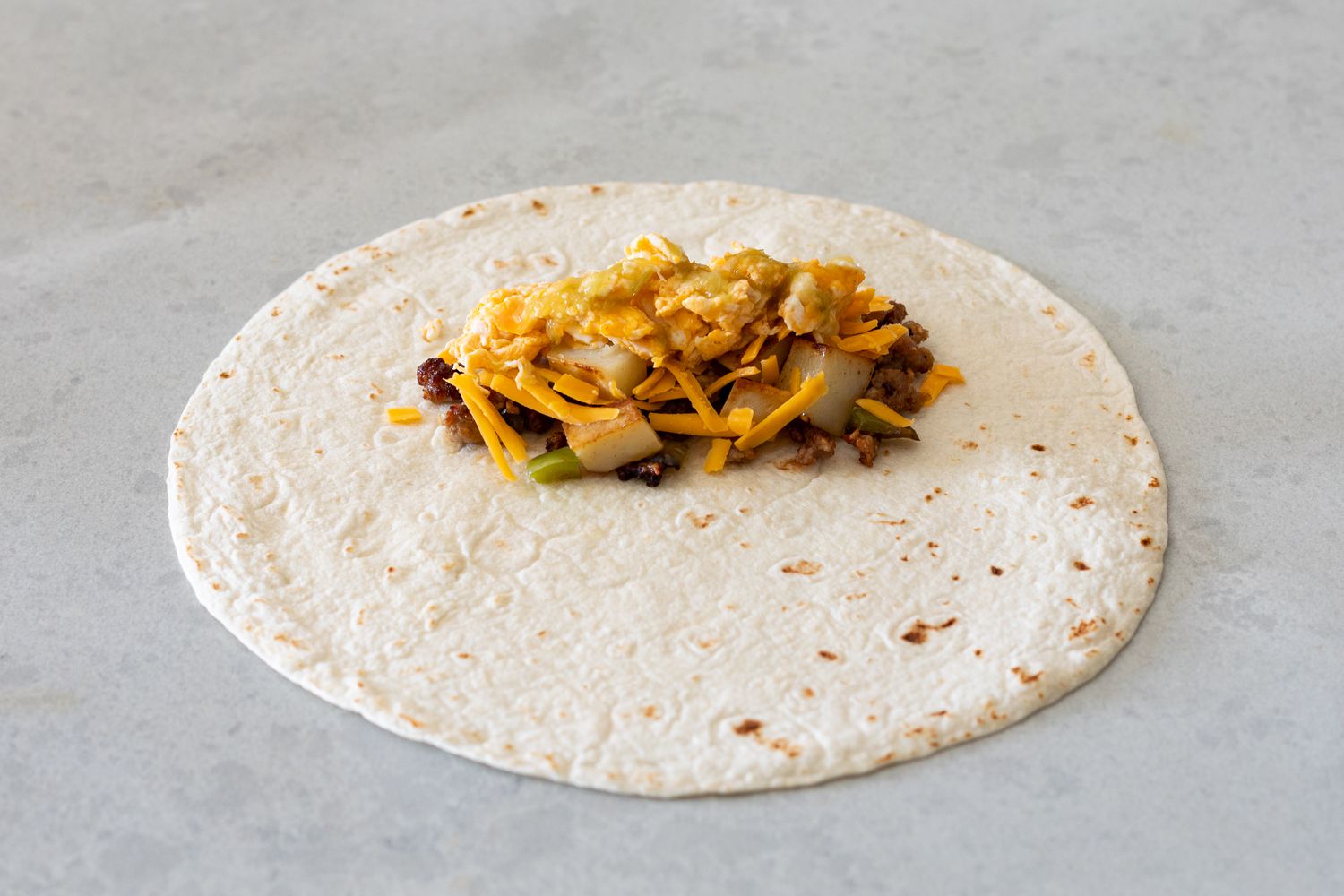 Burrito Filling Added to One End of the Tortilla