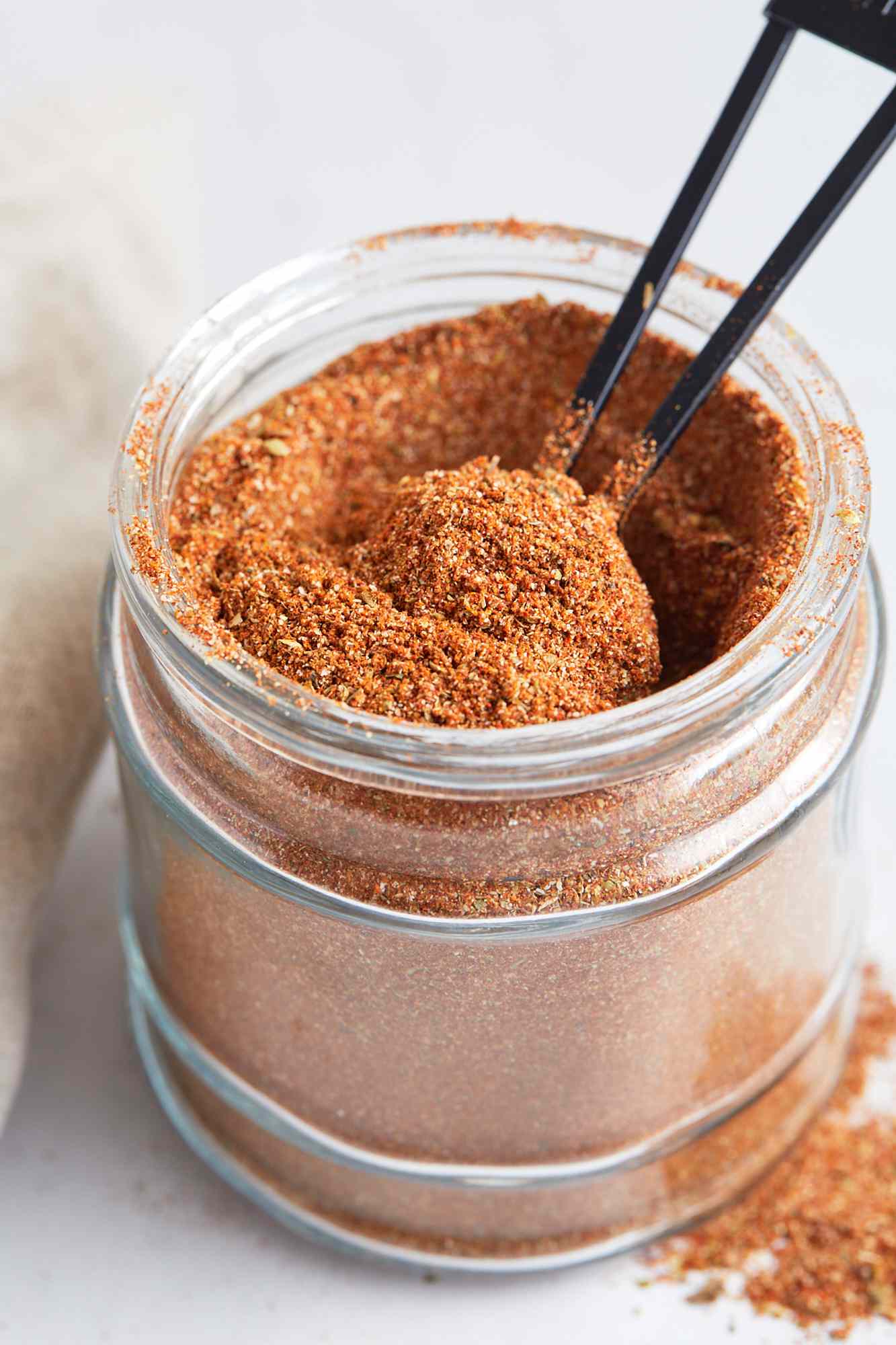 A tablespoon in a jar of homemade cajun seasoning