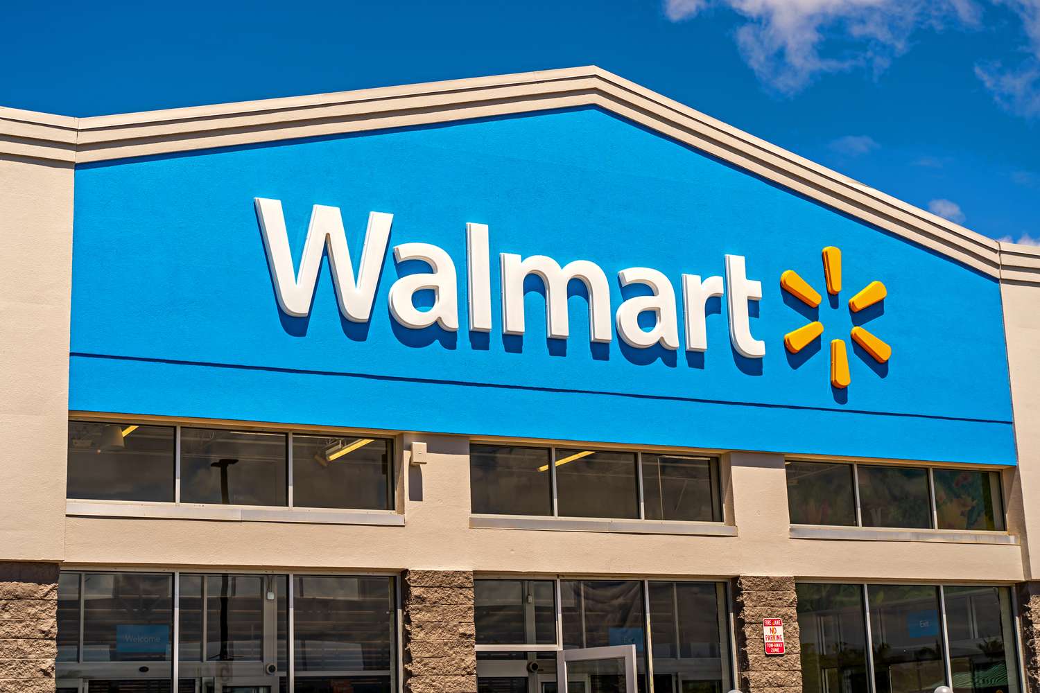 Front of a Walmart store, showing the entrance and logo