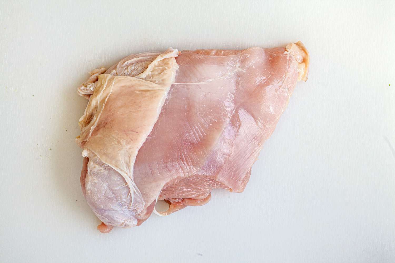 Raw turkey breast.