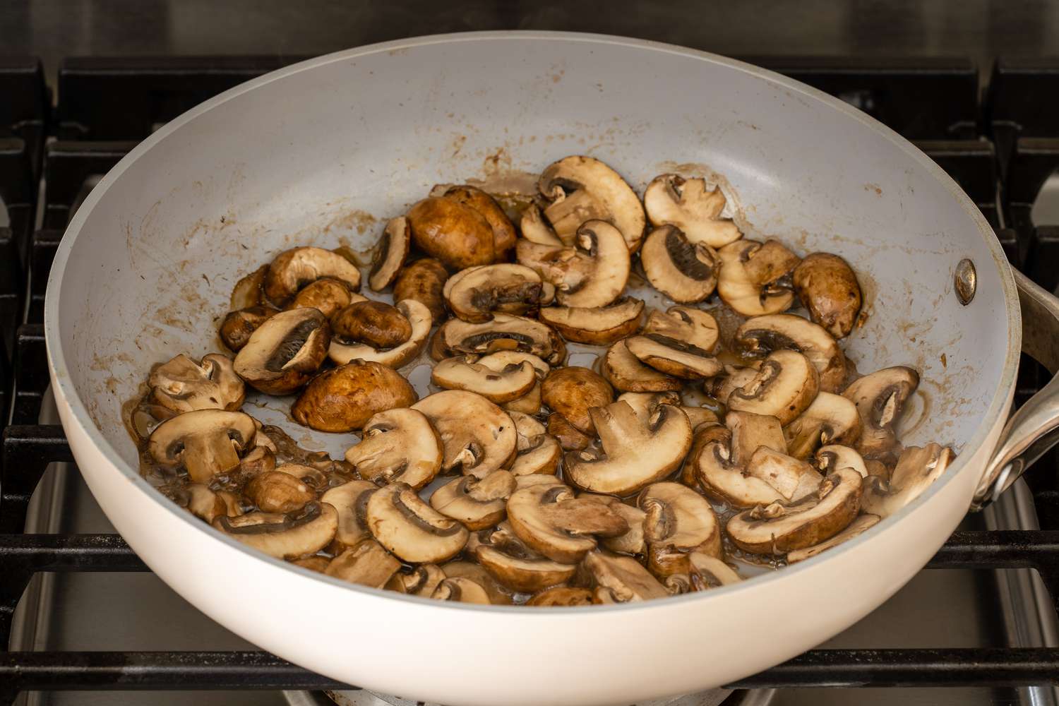 Mushrooms sautéed in pan