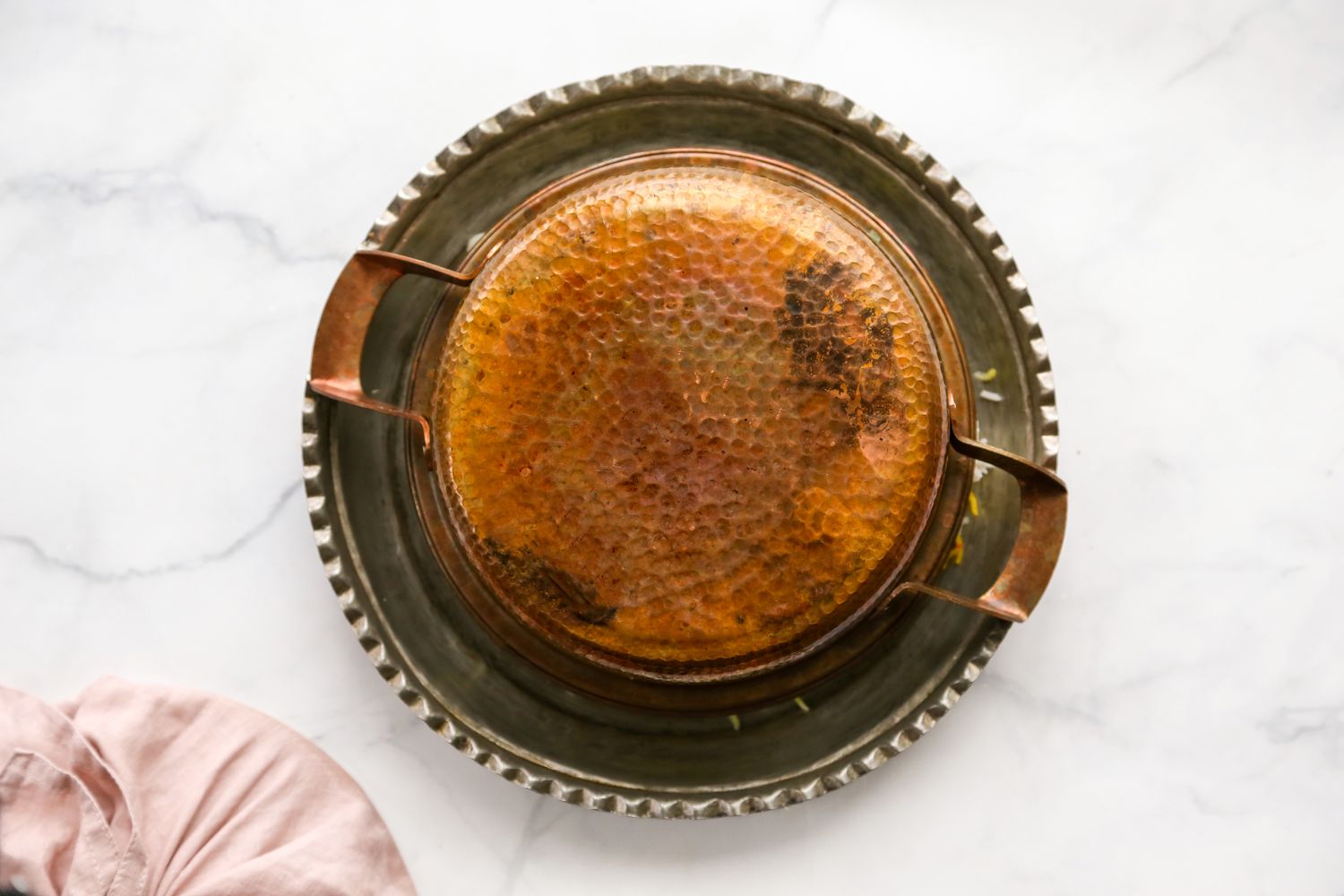 Tahdig Flipped onto an Ornate Silver Platter