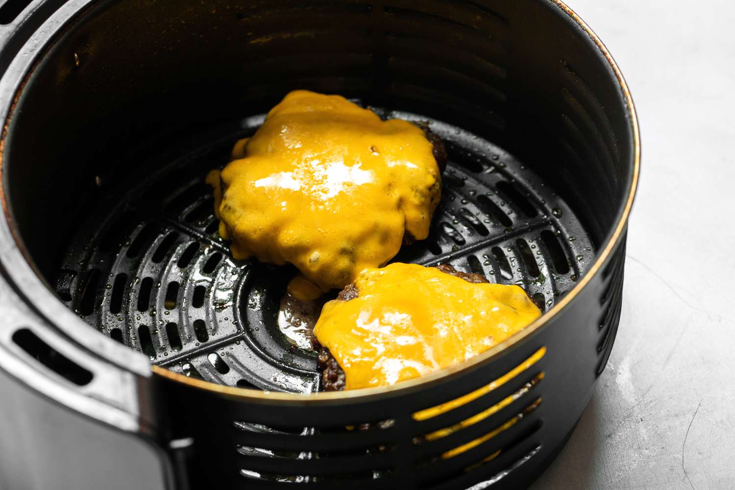 Cheese Melted on Burger Patties in Air Fryer