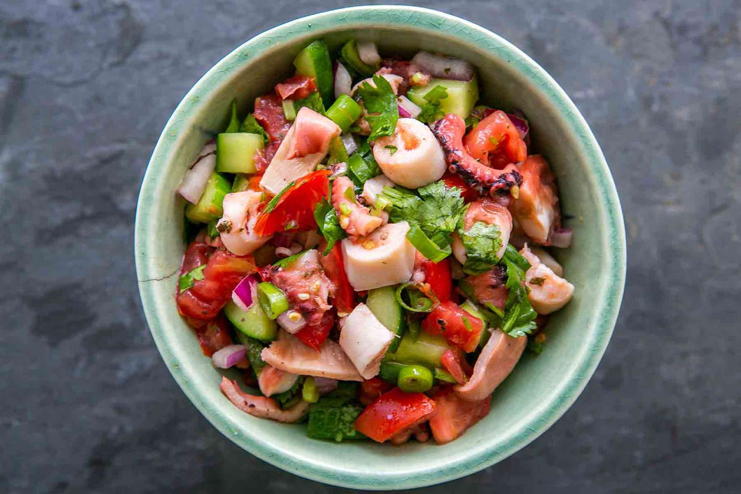 A bowl of octopus salad, ready to serve