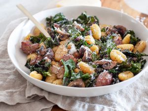 Sheet Pan Gnocchi With Mushrooms, Sausage, and Kale in a Bowl