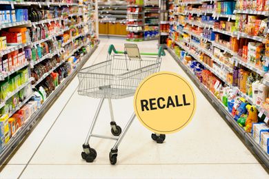 A food shopping cart ina. grocery store isle