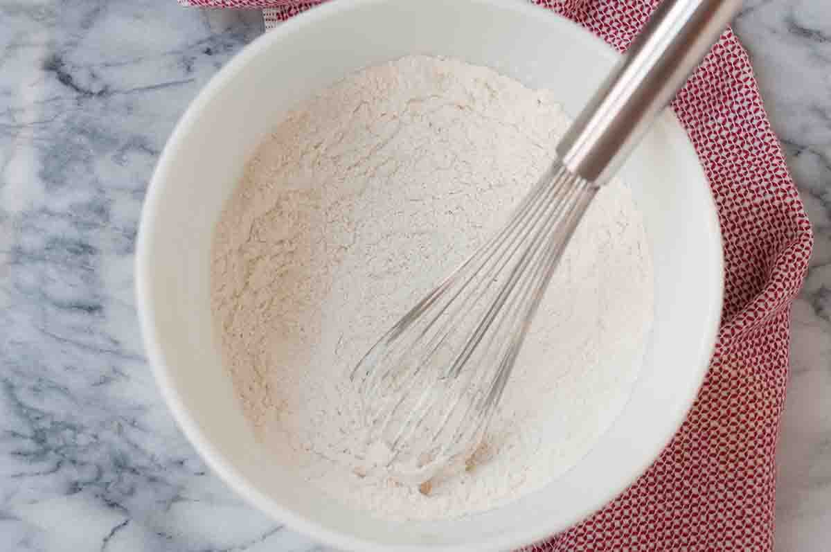 whisk together the flour, sugar, baking powder, baking soda, and salt for the waffle recipe