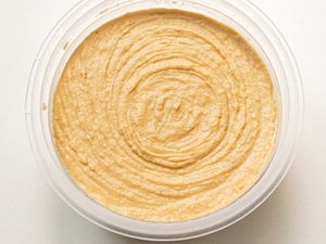 hummus in a container