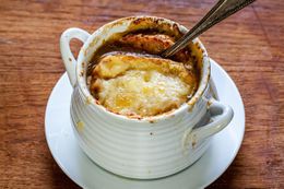 Vegetarian French onion soup with mushroom broth.
