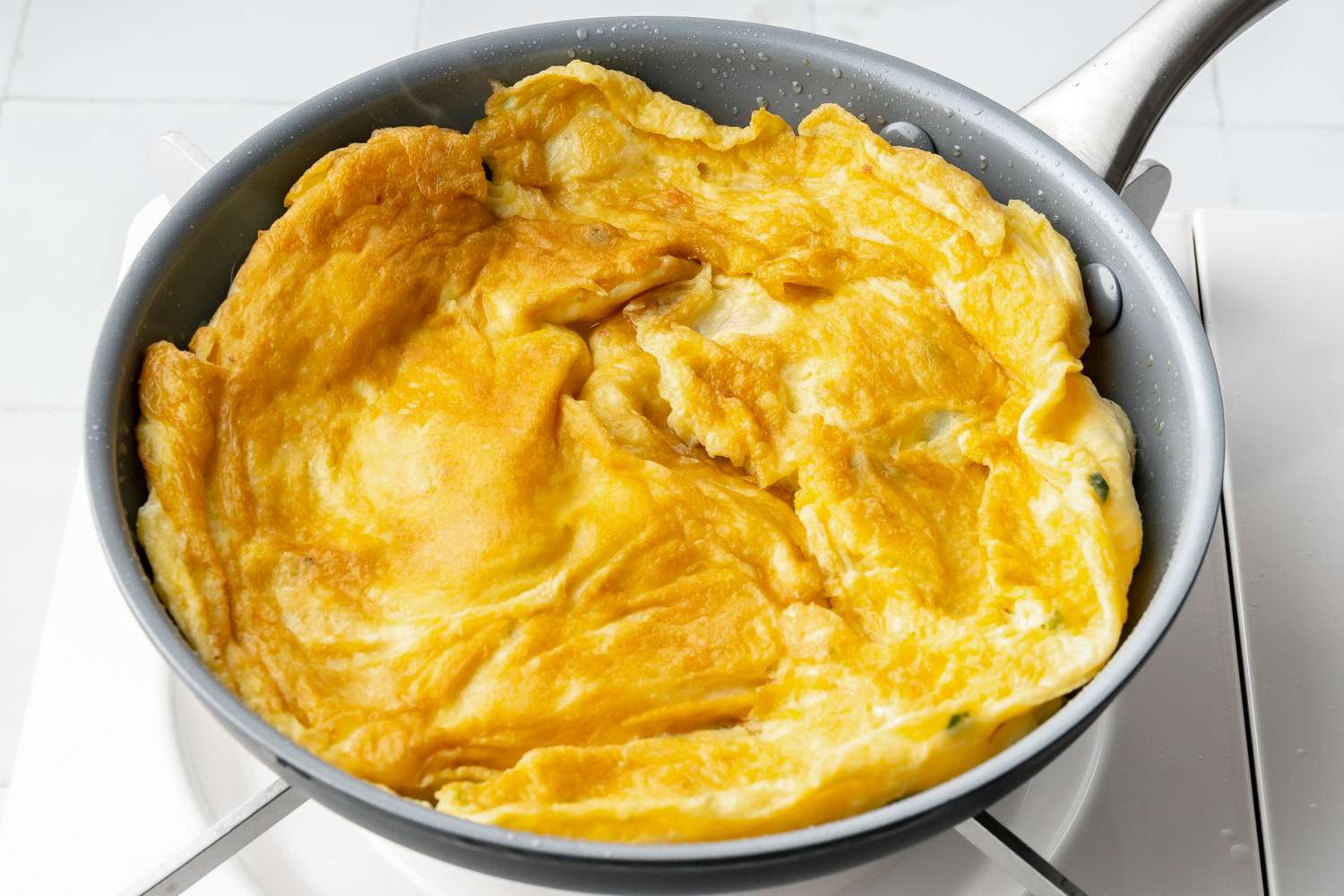 Thai Omelet Recipe Flipped in a Skillet