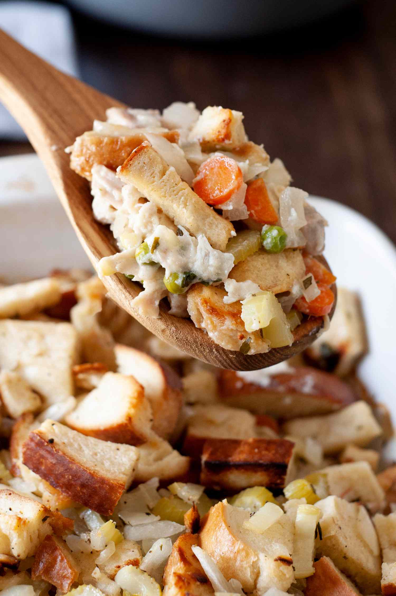 Scoop of chicken stuffing casserole.