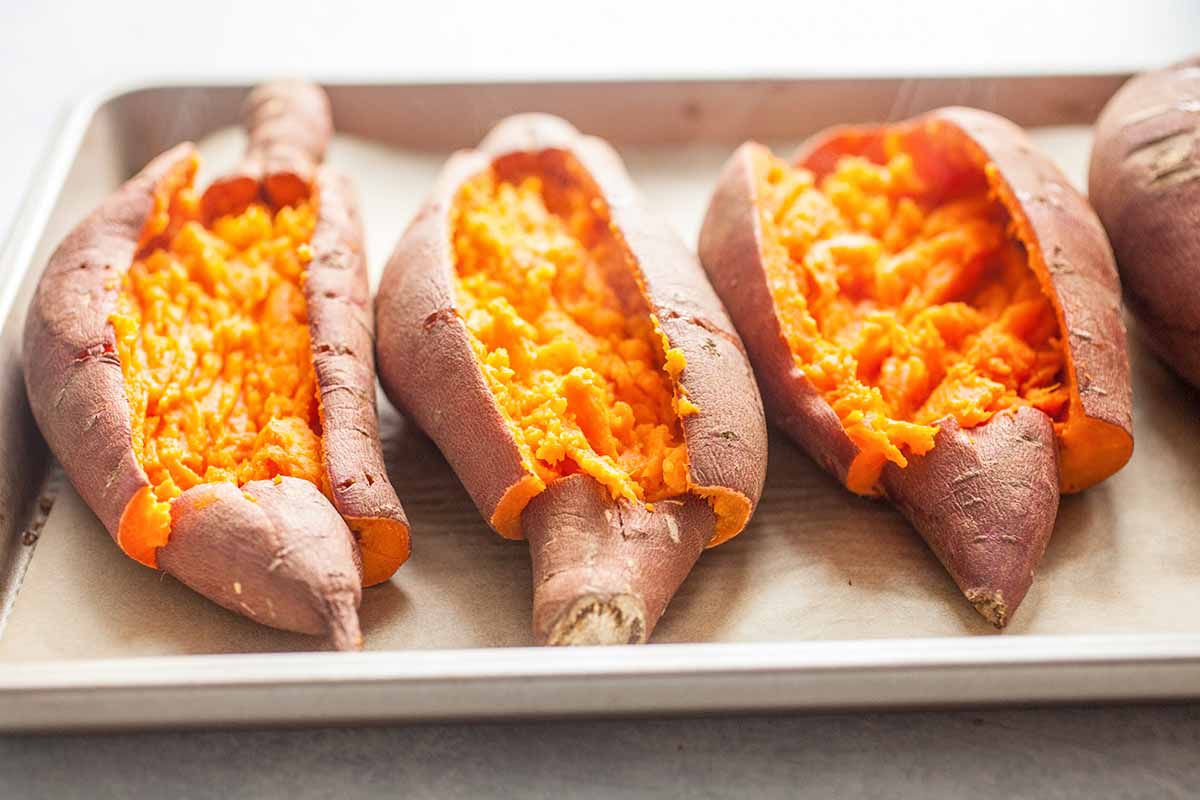 Twice Baked Sweet Potatoes with Cheese split open the potatoes
