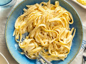 Plate of fettuccine Alfredo with a fork