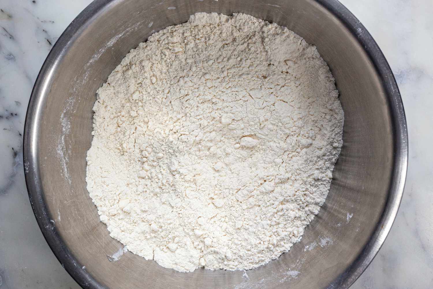 Irish Soda Bread dry ingredients in a bowl with the butter worked in
