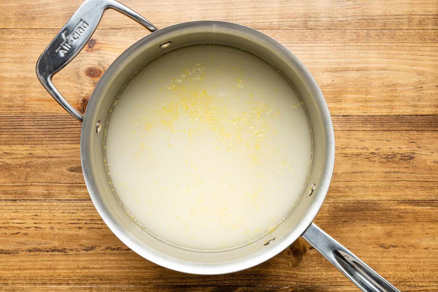 Sugar, Water, and Lemon Zest in a Sauce Pan for Turkish Delight (Lokum) Recipe