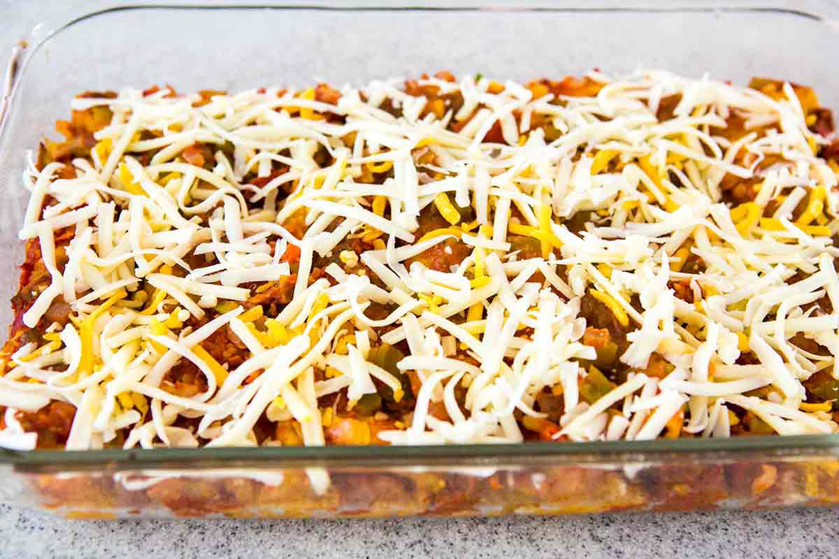 sprinkle enchiladas with cheese