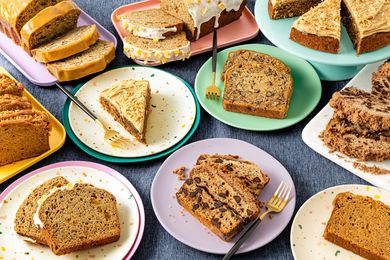 Platters and plates filled with different kinds of banana bread