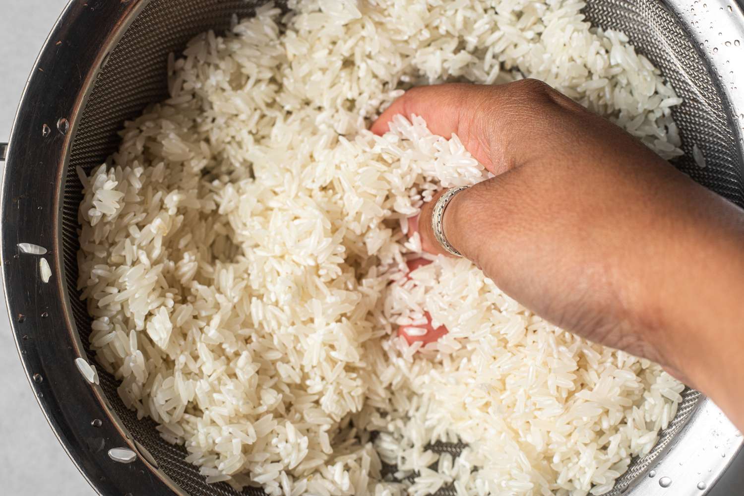 Rice Washed in Sieve for Coconut Lime Rice