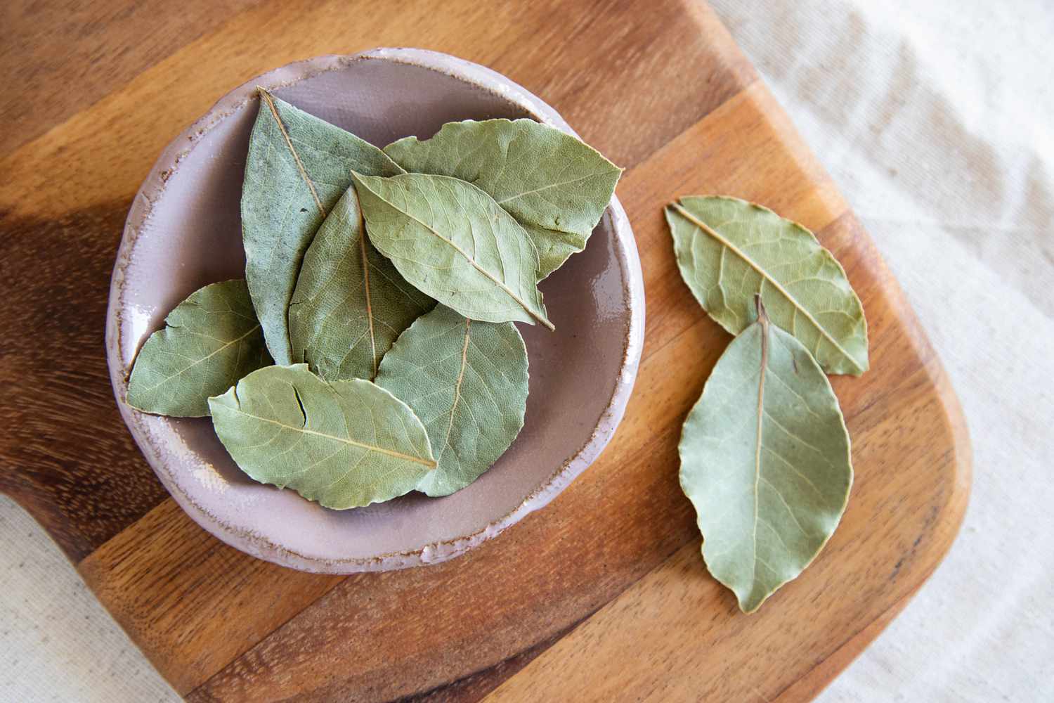 Fried bay leaves in lavender bowl