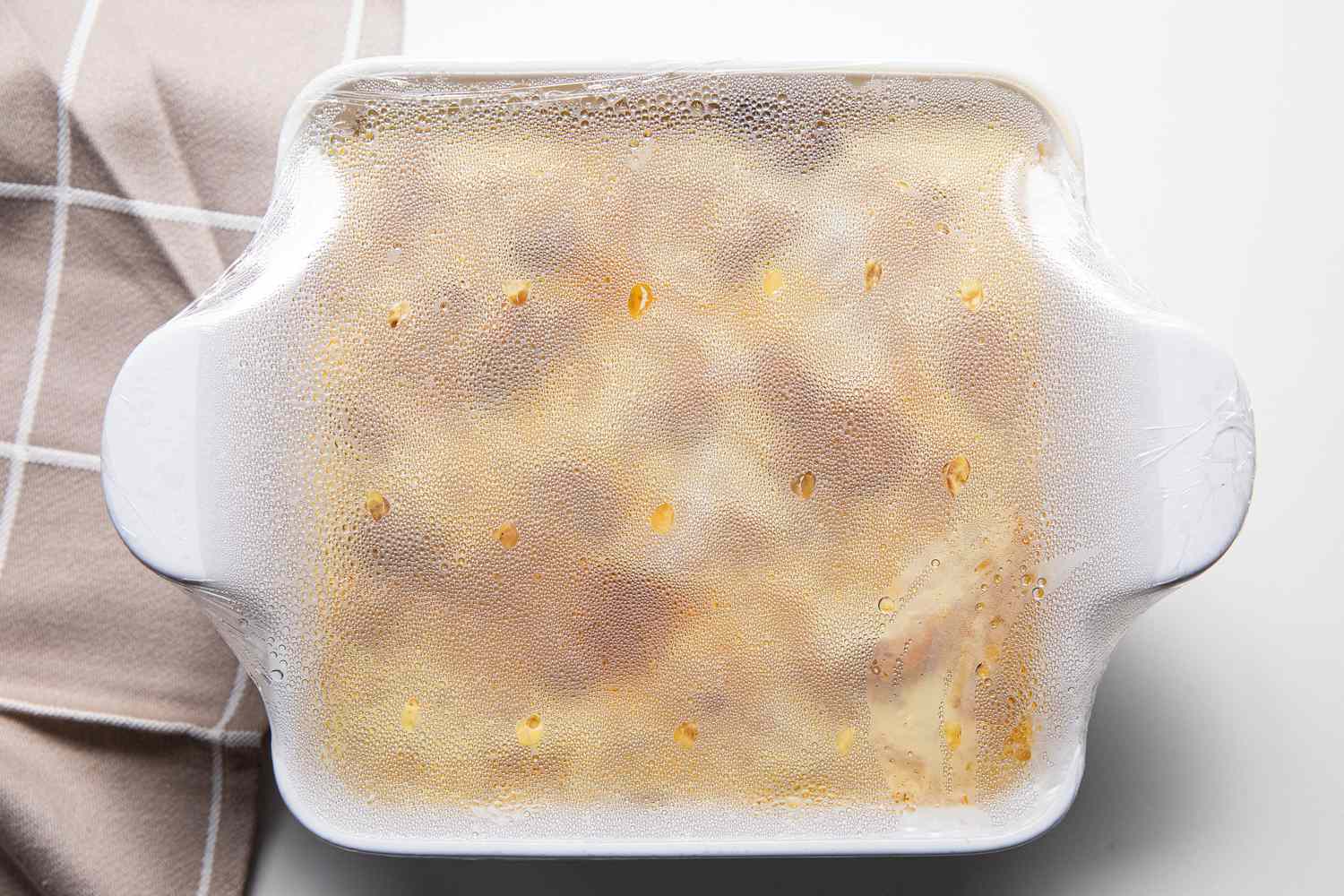 Baking Dish Covered with Plastic Wrap for Microwave Japanese Oyakodon Recipe