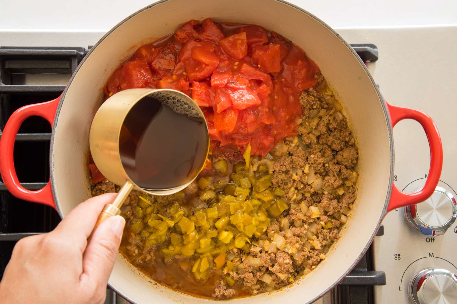 Tomatoes and Beef Stock Added to Stovetop Taco Soup