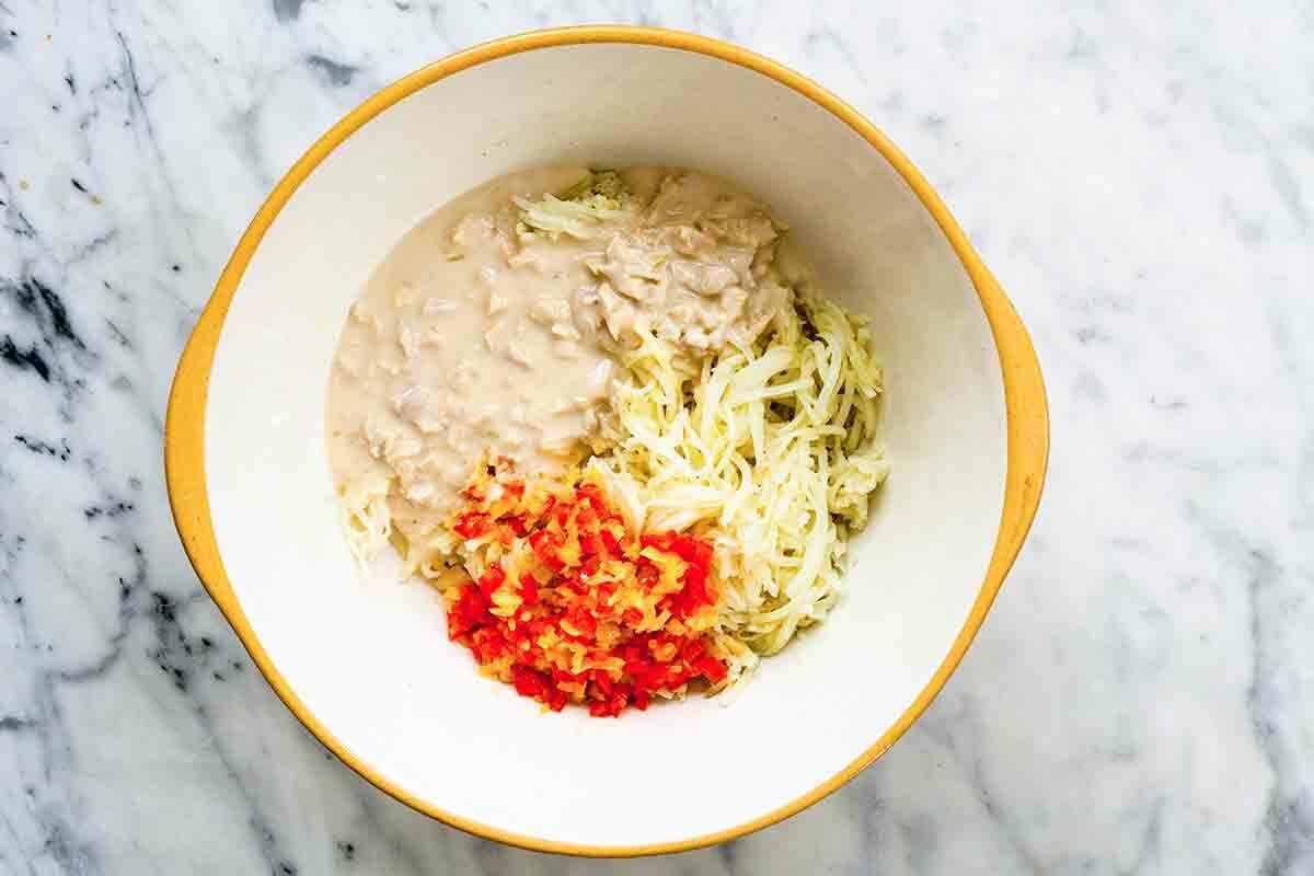 Funeral Potatoes Ingredients - cream of chicken soup, potatoes, red peppers