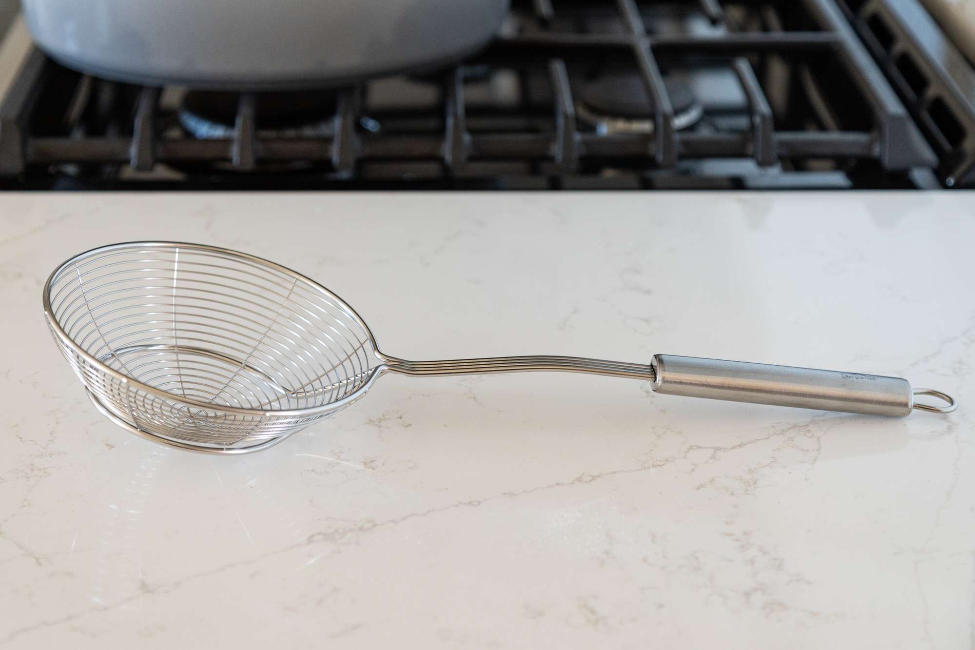 Spider strainer on a counter 
