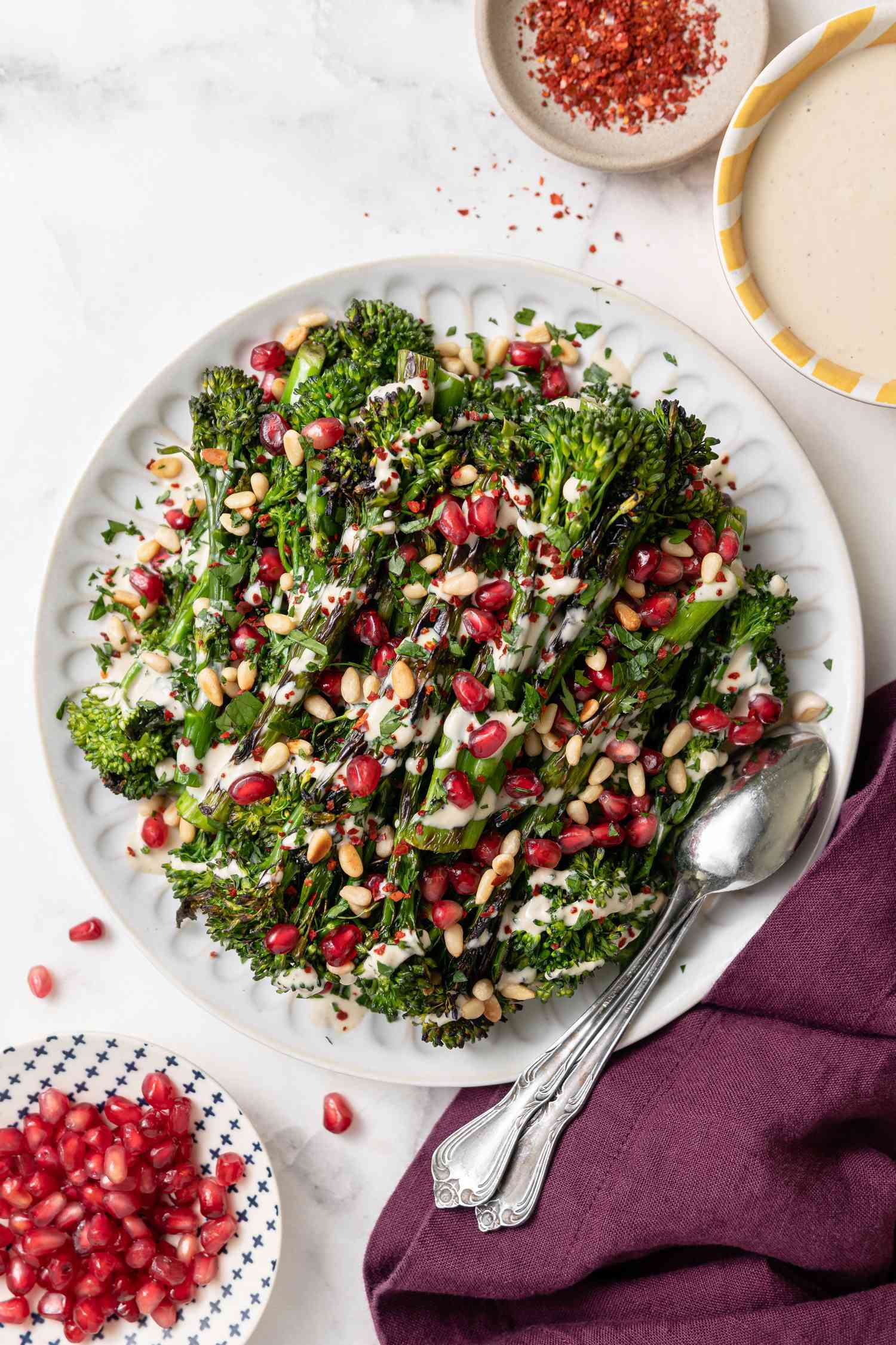 Grilled Broccolini with Lemon Tahini Dressing and Pomegranate Arils