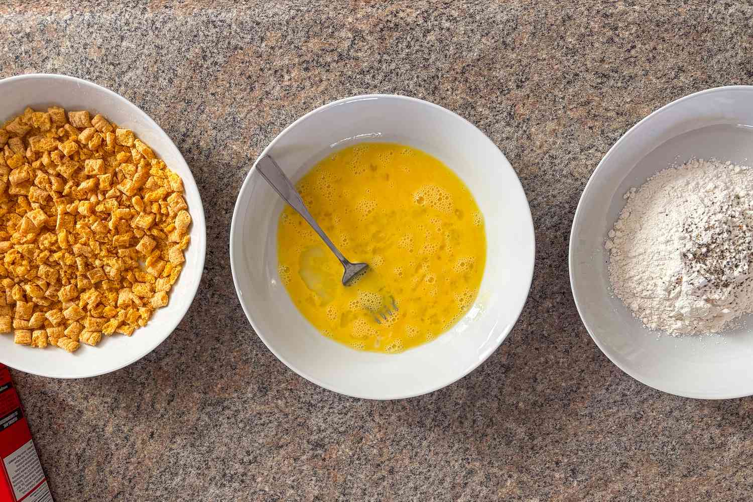 three bowls with wet and dry ingredients for Ree Drummond's 4-Ingredient Chicken Strips