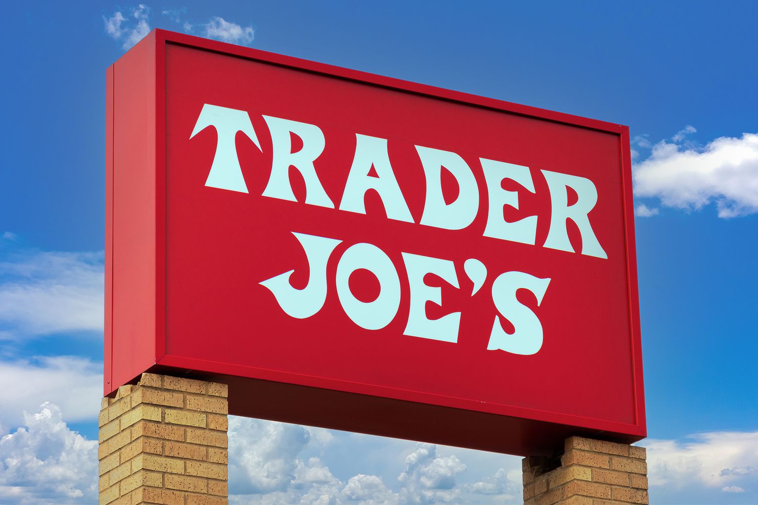 A Trader Joe's store sign on a red background