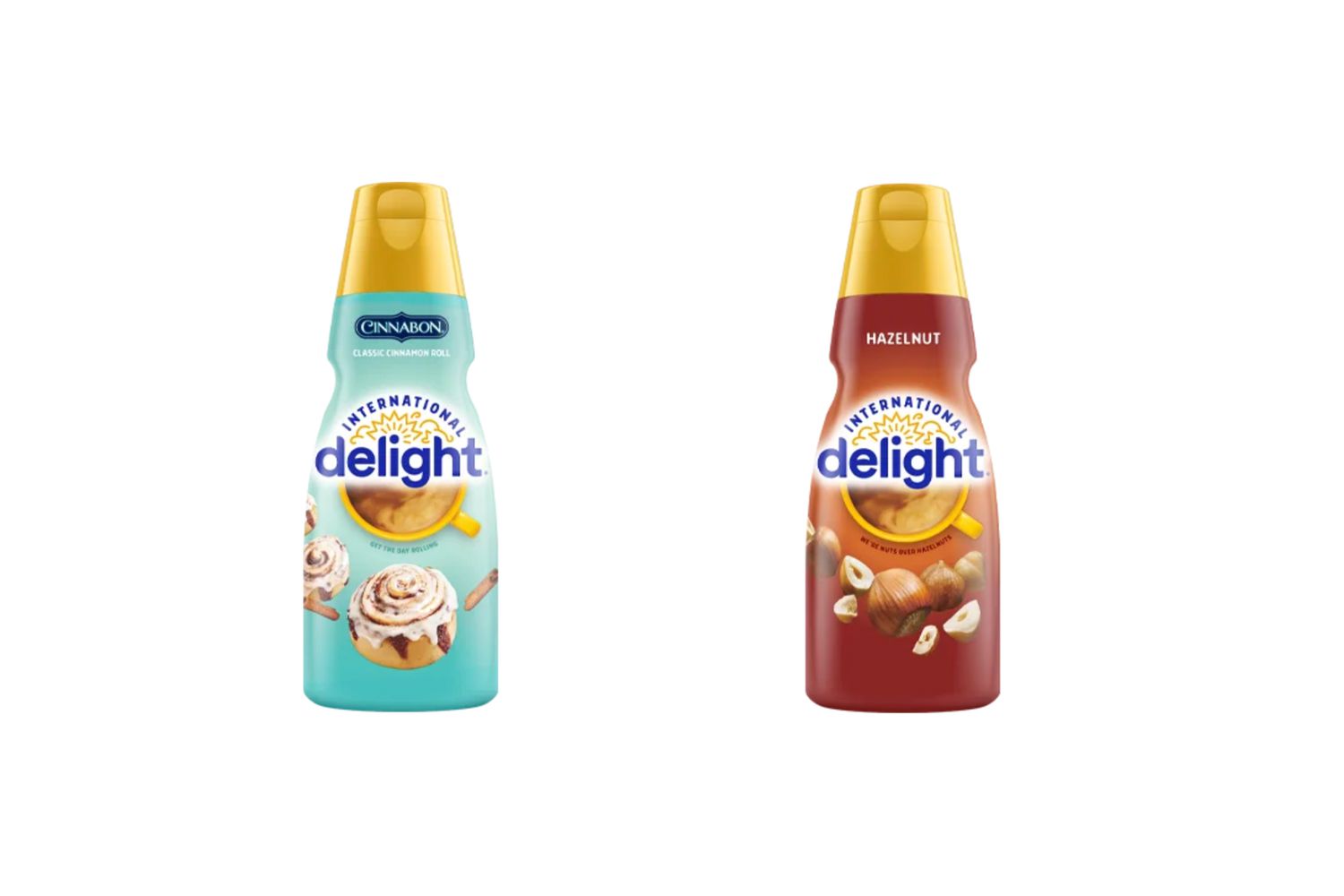 A blue bottle of International Delight Cinnabon coffee creamer next to a bottle of International Delight hazelnut coffee creamer