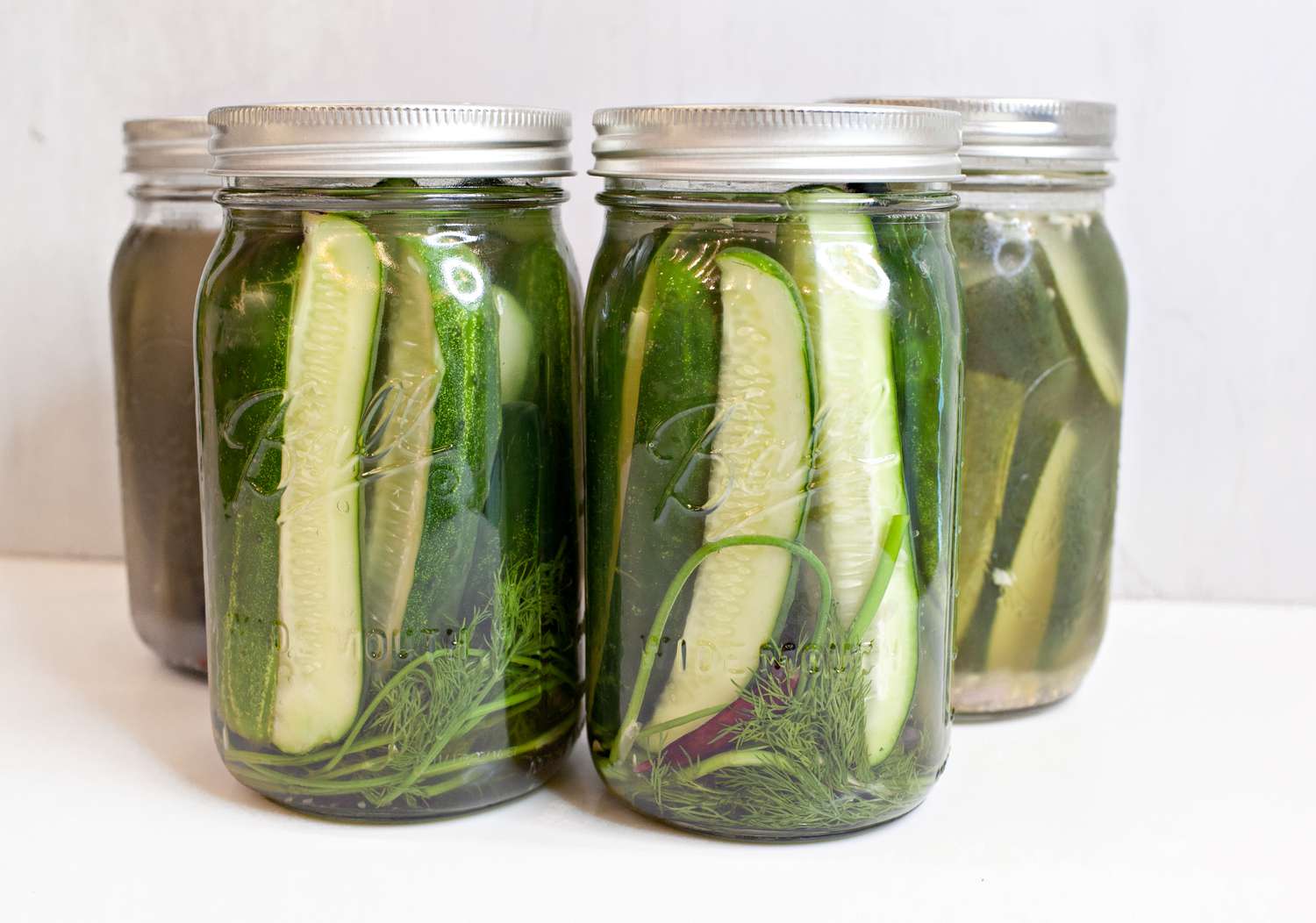 Jars of Fermented Pickles on a Counter
