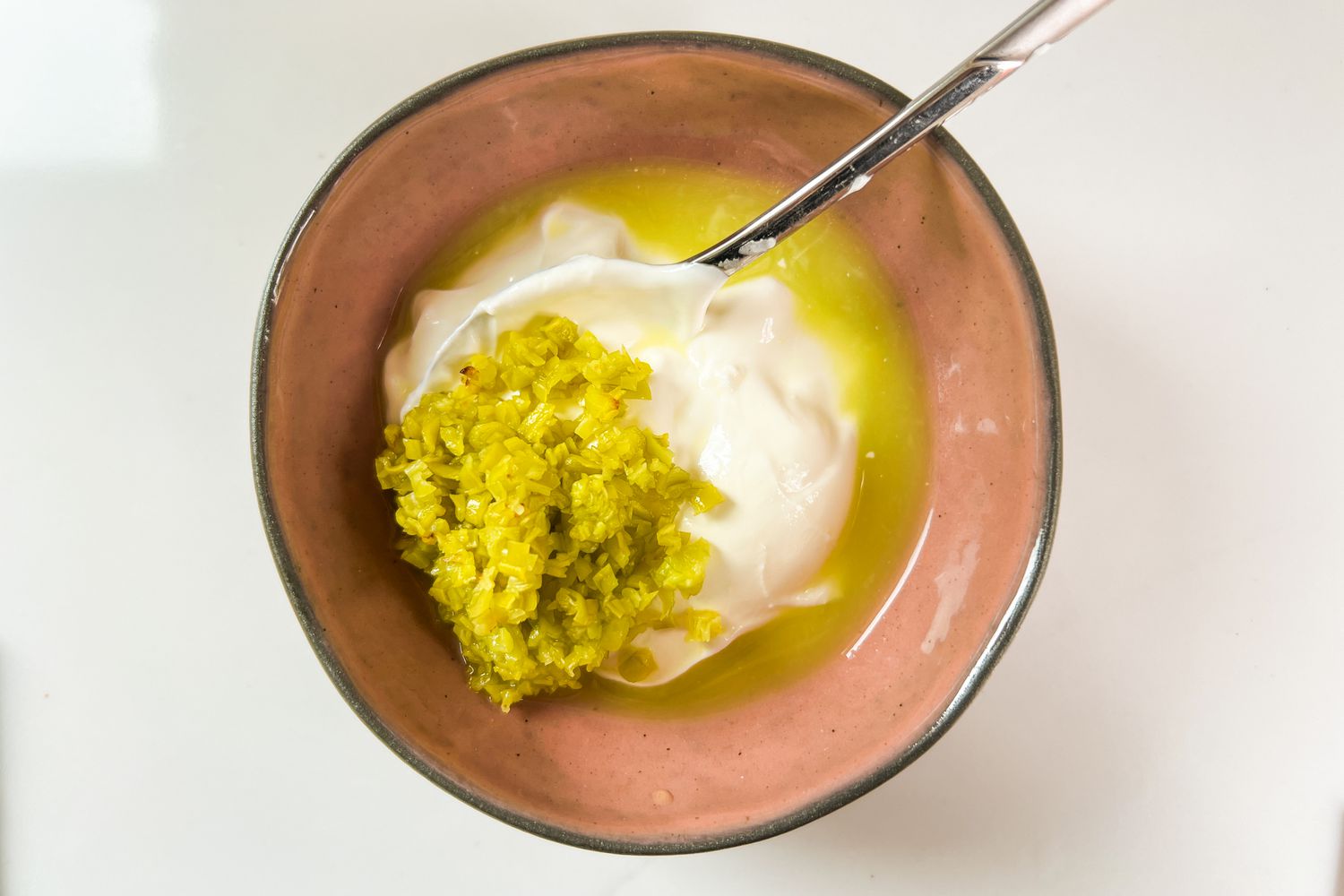 Sour cream, pickling liquid, and diced pepperoncini