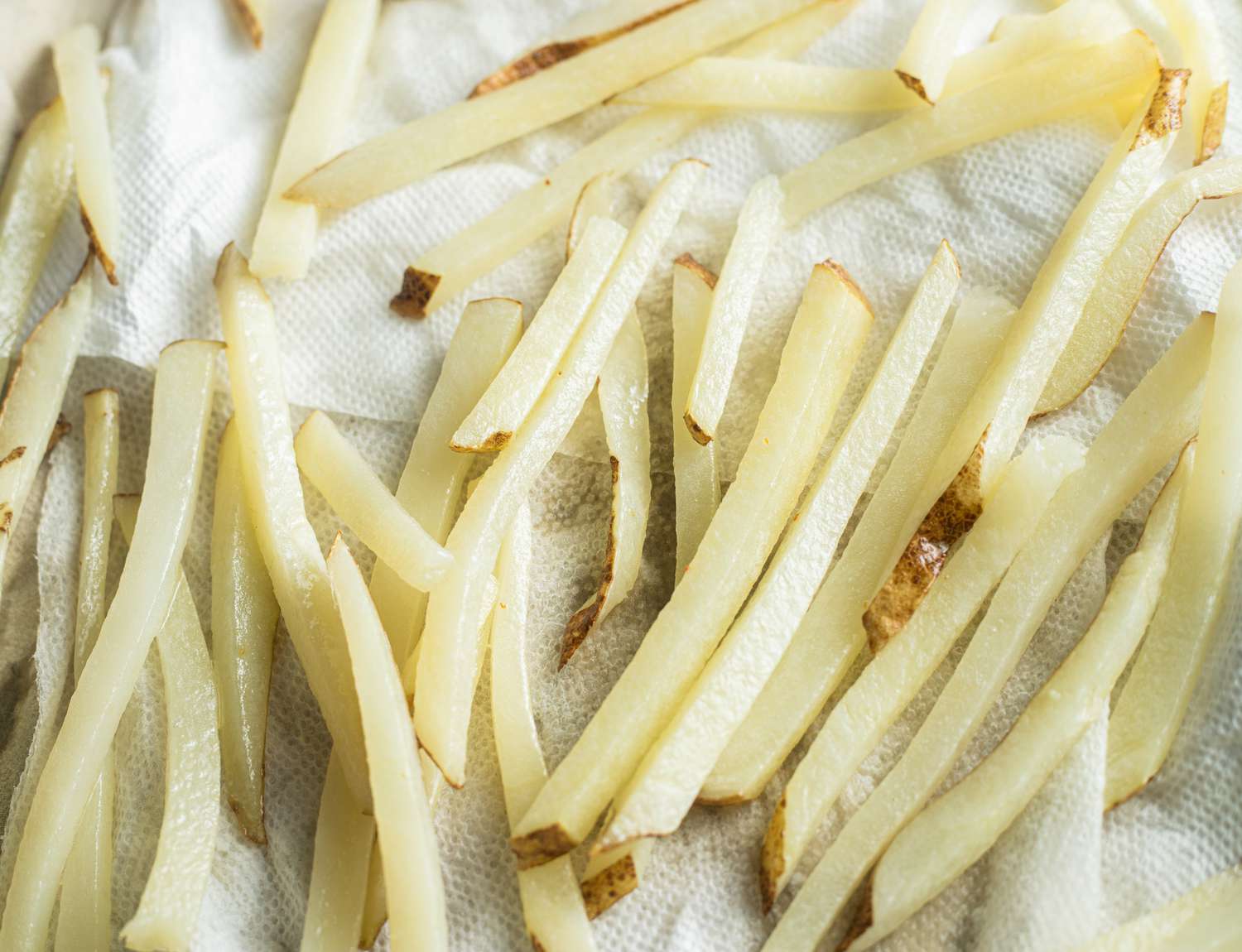 Homemade French Fries on Paper Towels After First Fry