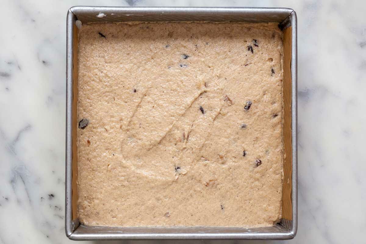 Applesauce cake recipe in a baking pan.