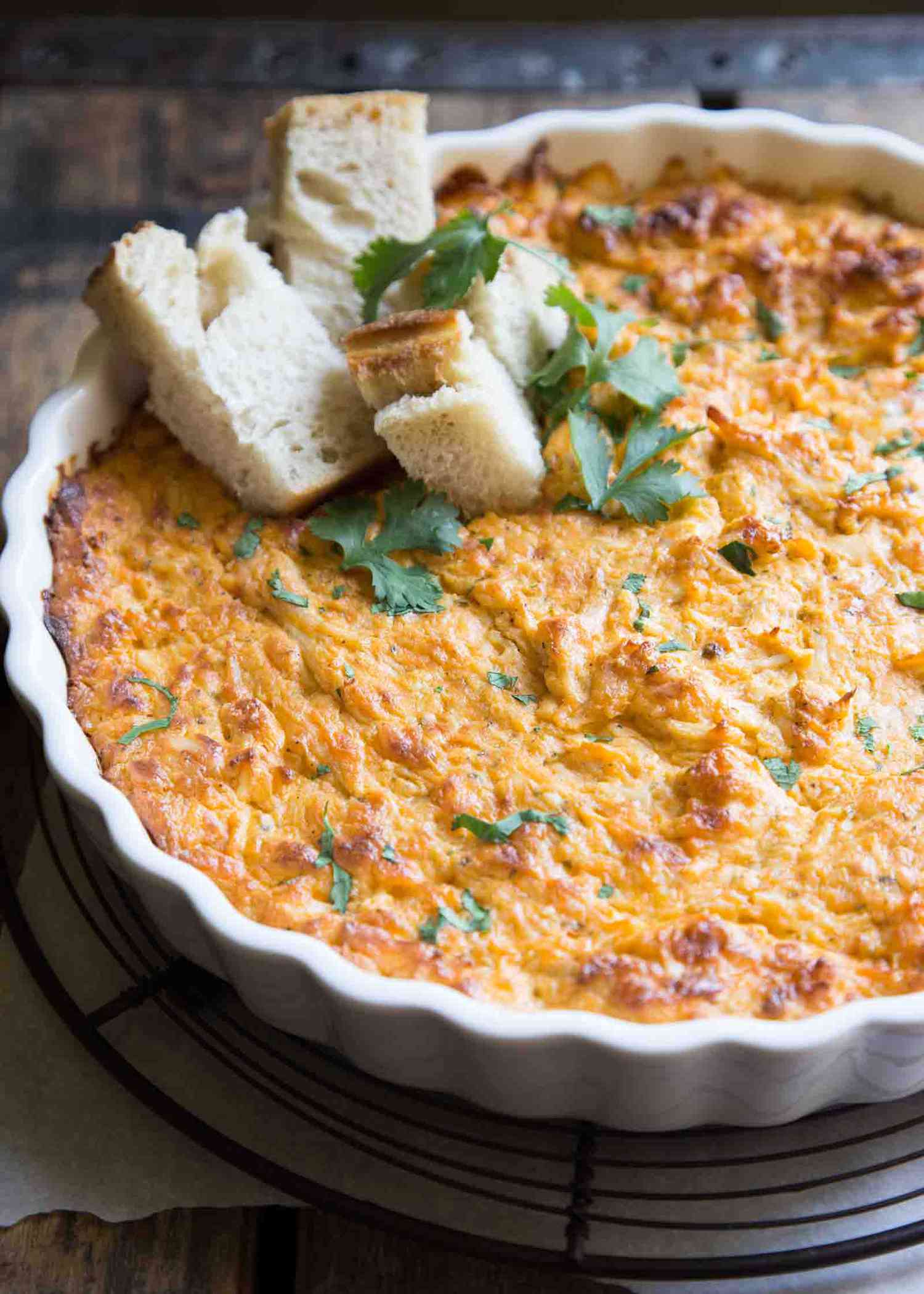 Hot Buffalo Chicken Dip in a white dish ready to serve
