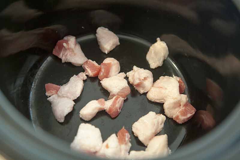 Salt pork at bottom of slow cooker for baked beans