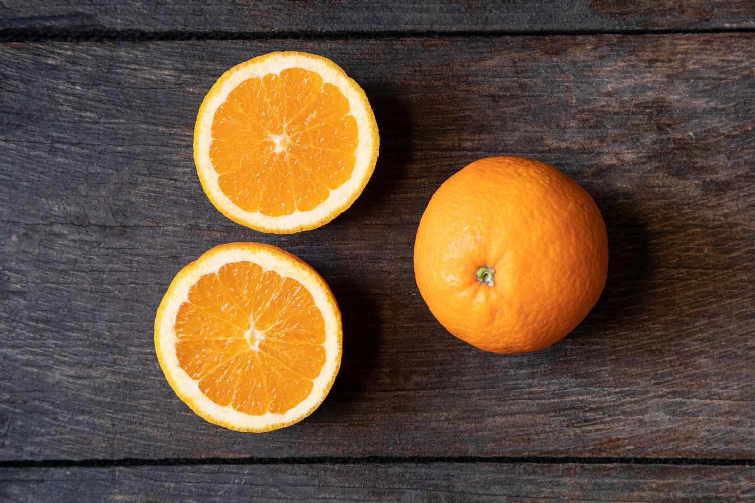 Valencia oranges on dark background