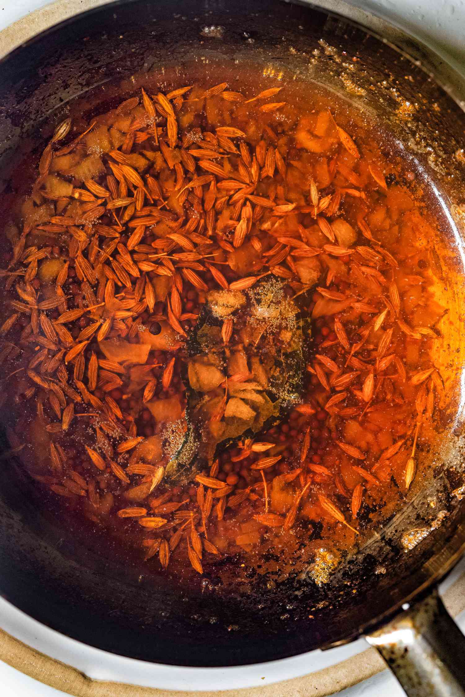Whole spices in oil for blooming