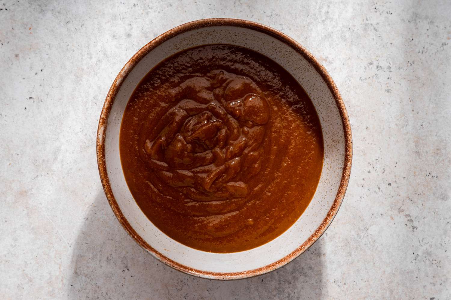 Bowl of pumpkin-marshmallow filling for no-bake pumpkin pie recipe 