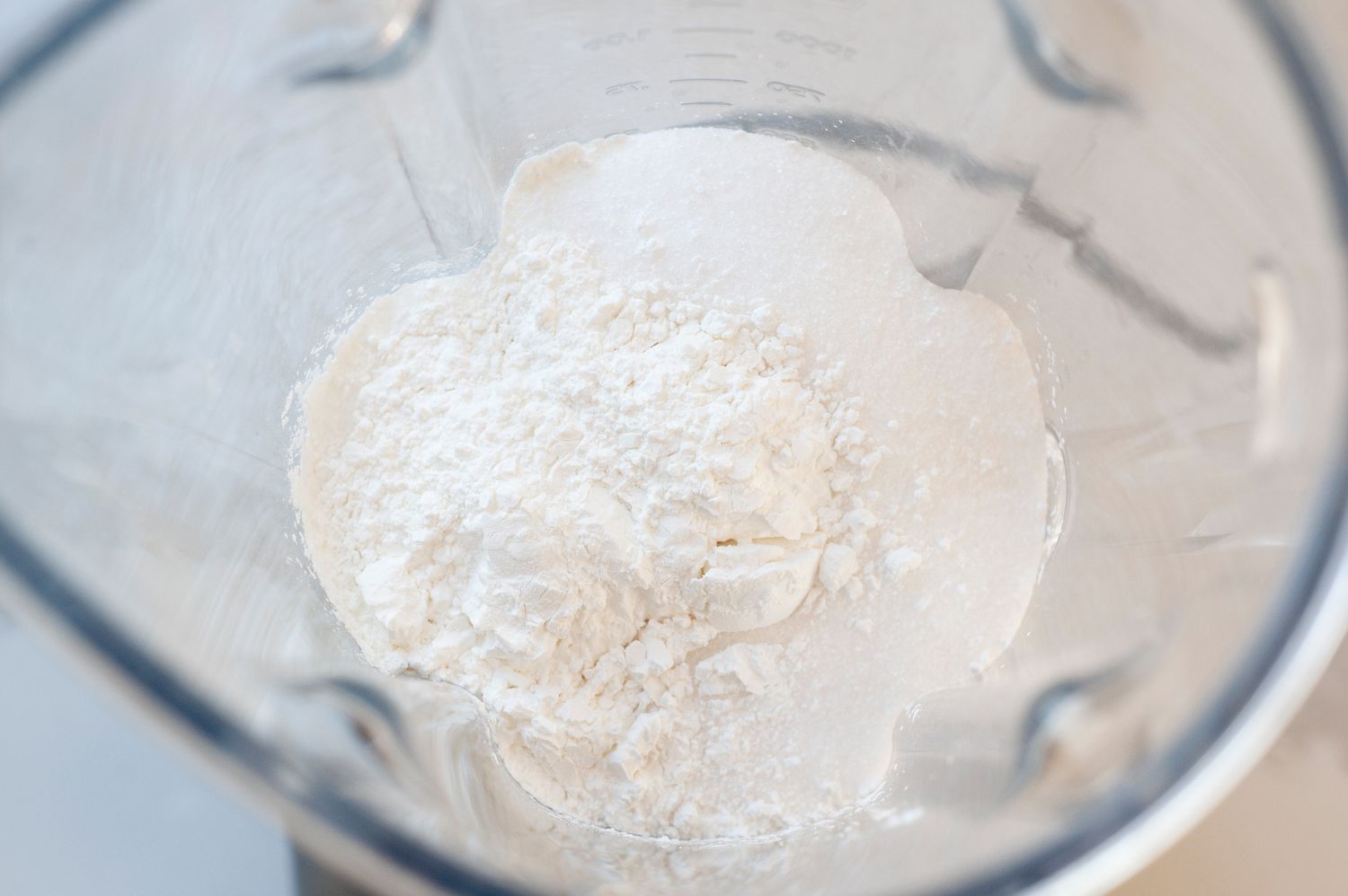 Sugar and cornstarch in a blender to make powdered sugar