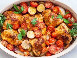 Paprika Chicken and Potatoes with Tomatoes horizontal in a baking dish