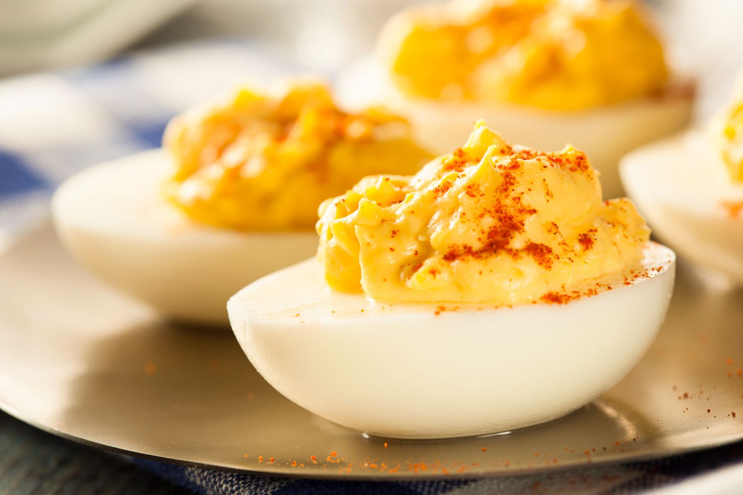 Closeup view of deviled eggs sprinkled with paprika