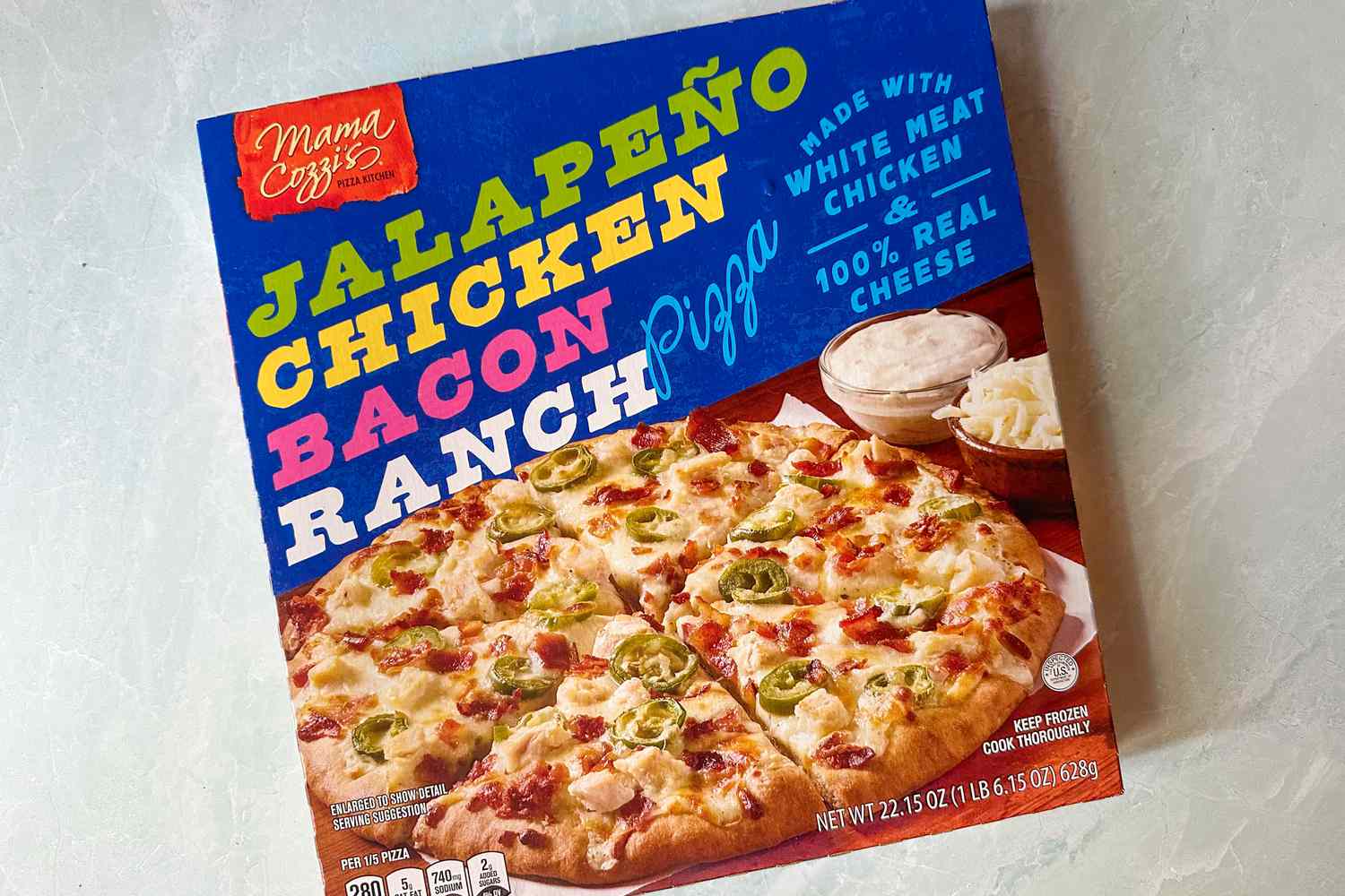 A pizza box labeled Mama Cozzi's JalapeÃ±o Chicken Bacon Ranch Pizza