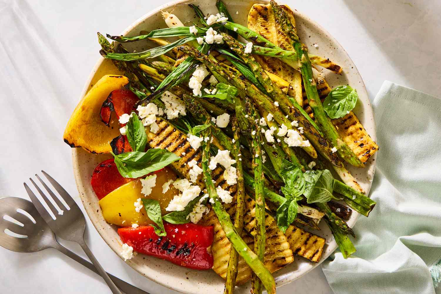 Plate with grilled vegetables and garnishes