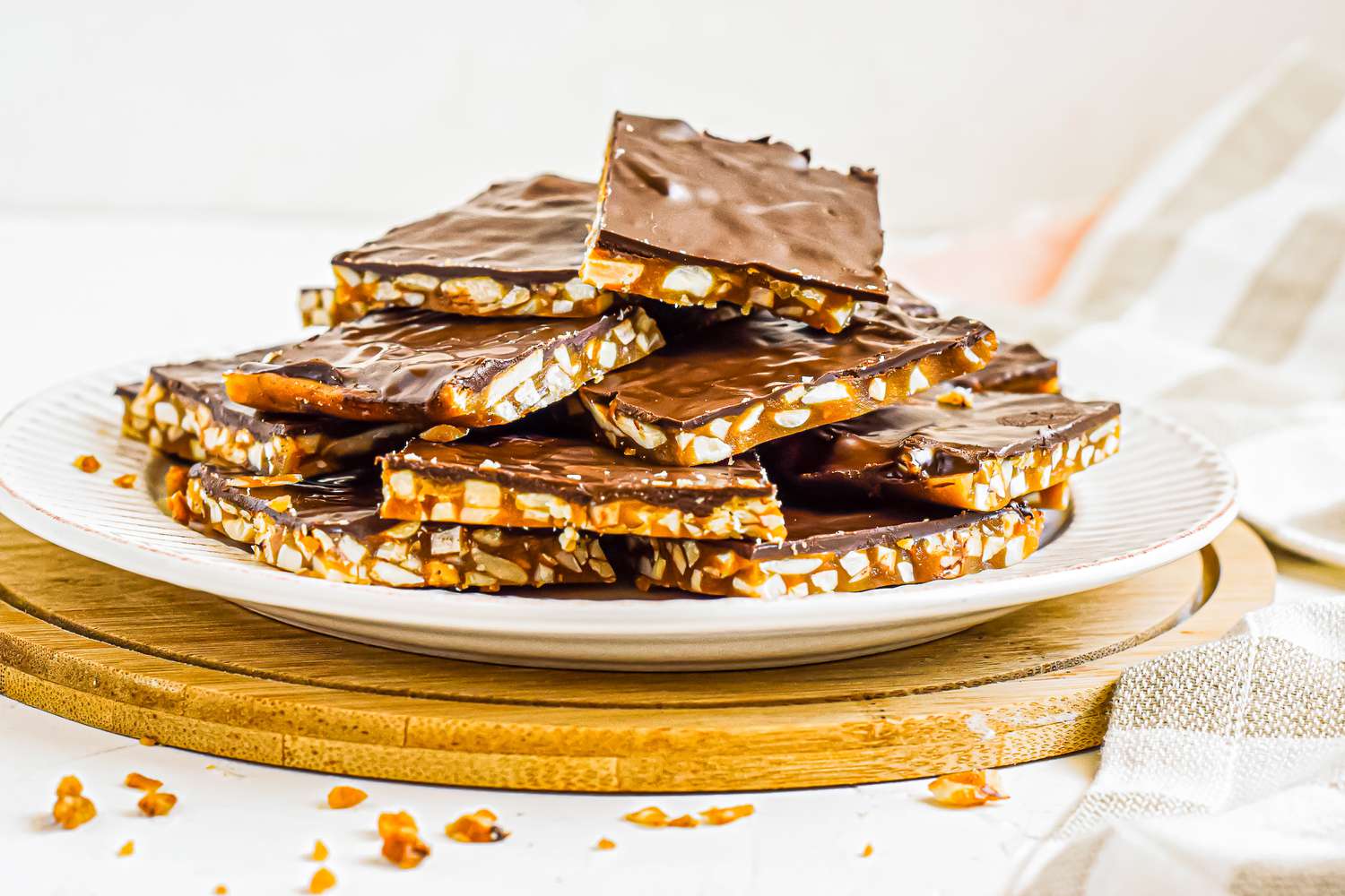 Side view of roca candy piled on a plate.