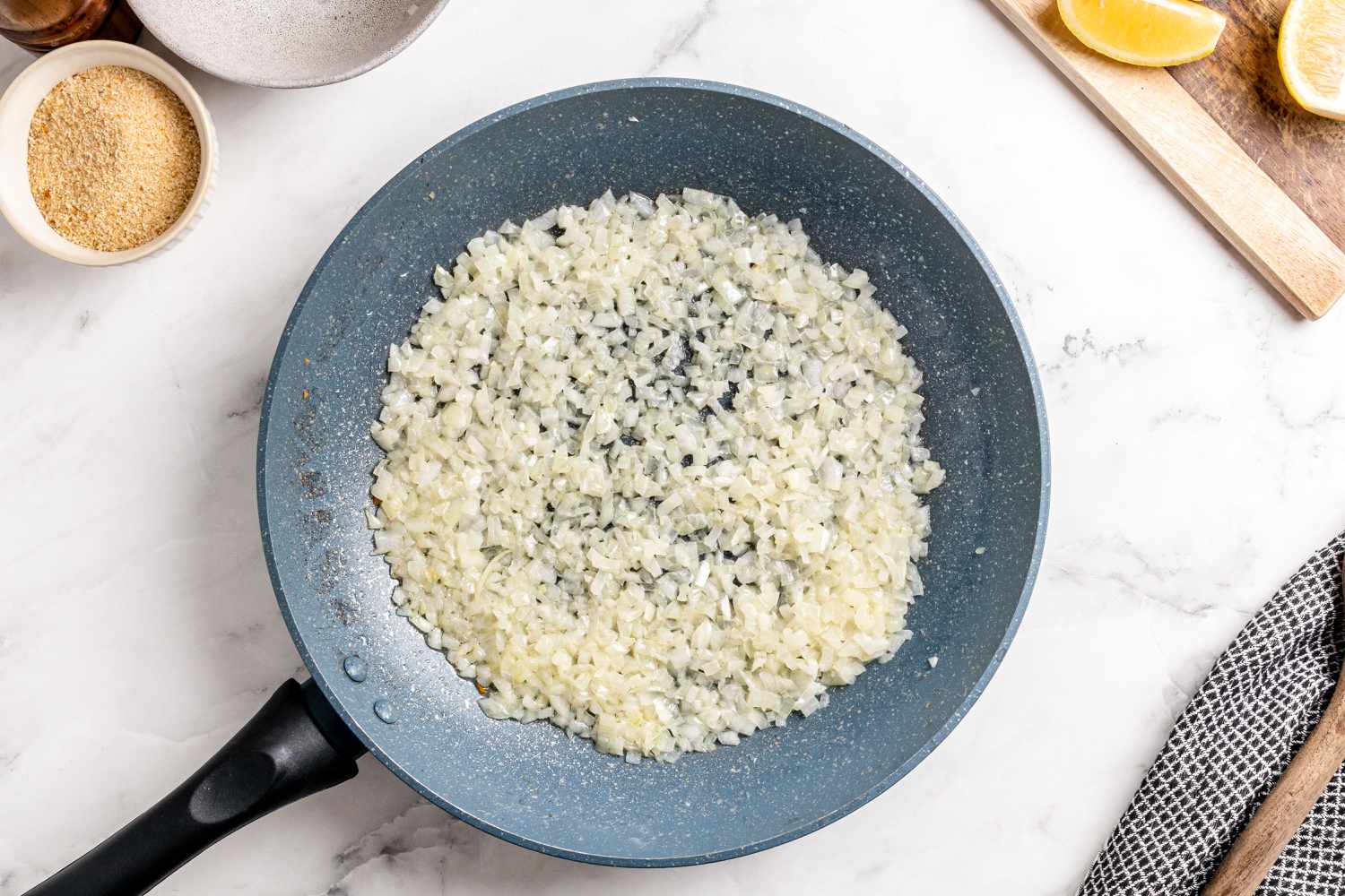 Minced shallots in a skillet
