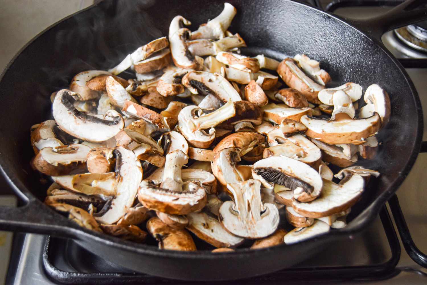Mushrooms Added to Skillet for A Better Way to Cook Mushrooms