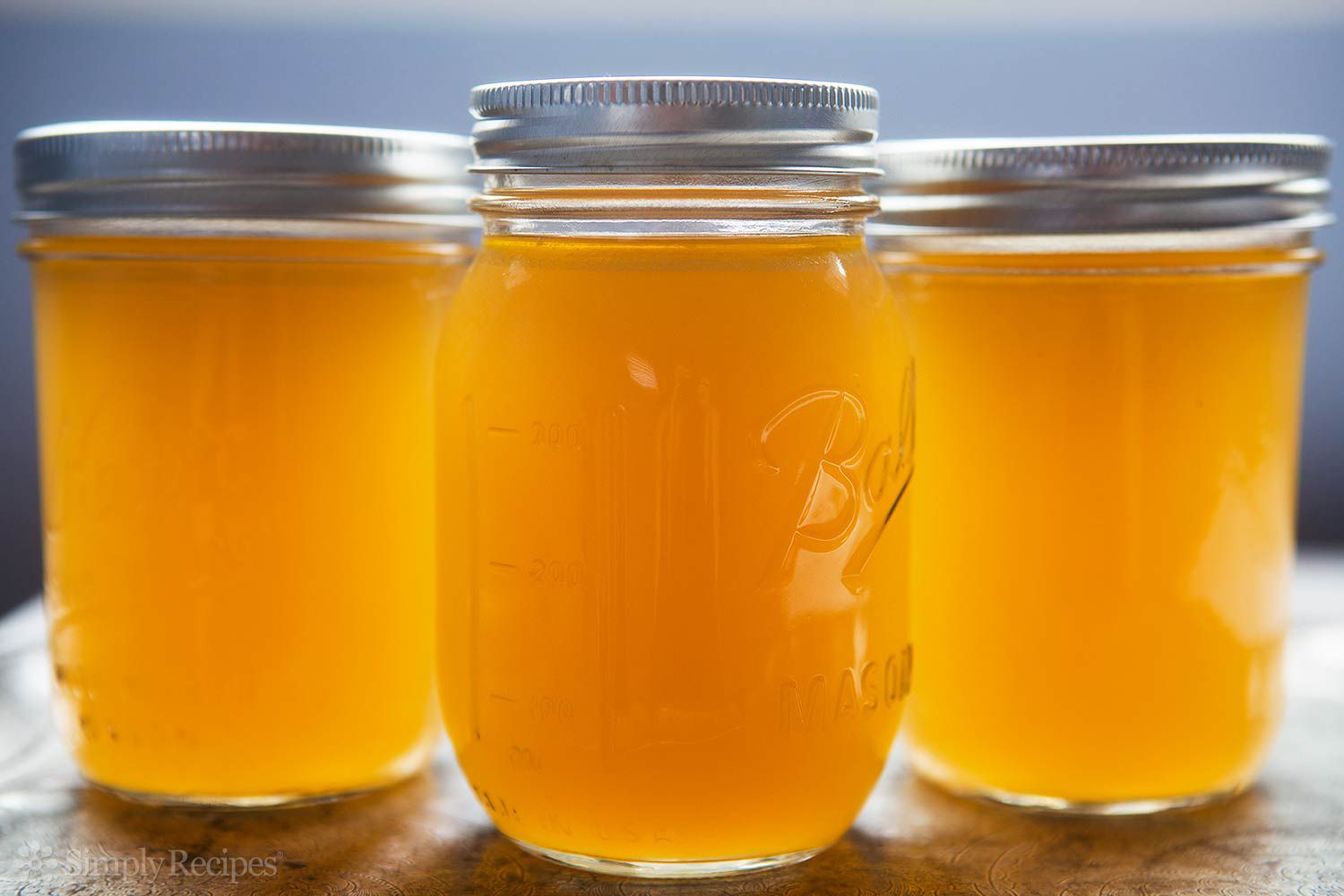 Chicken Stock in three lib covered jars