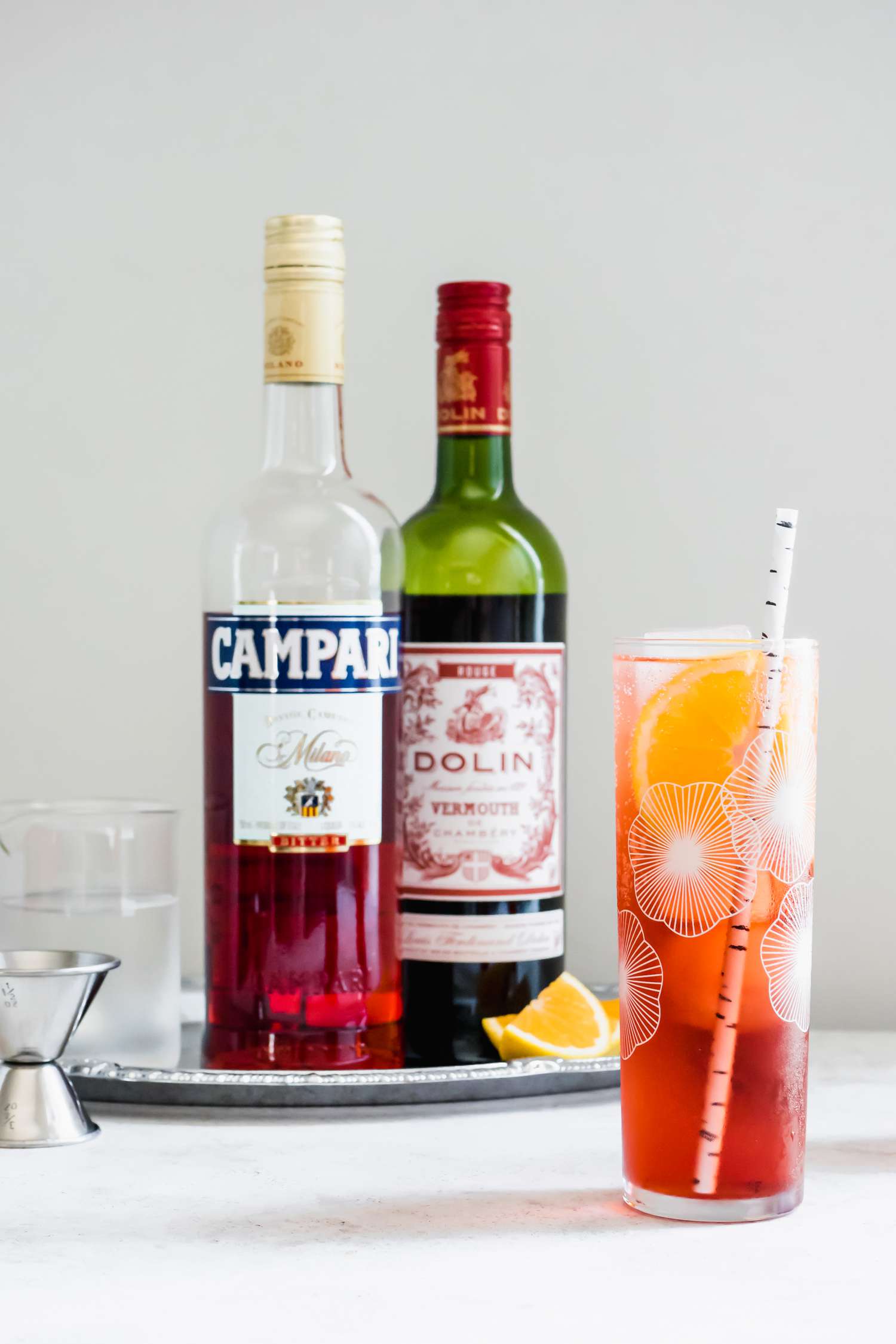 Americano Cocktail with Ingredients in the Background